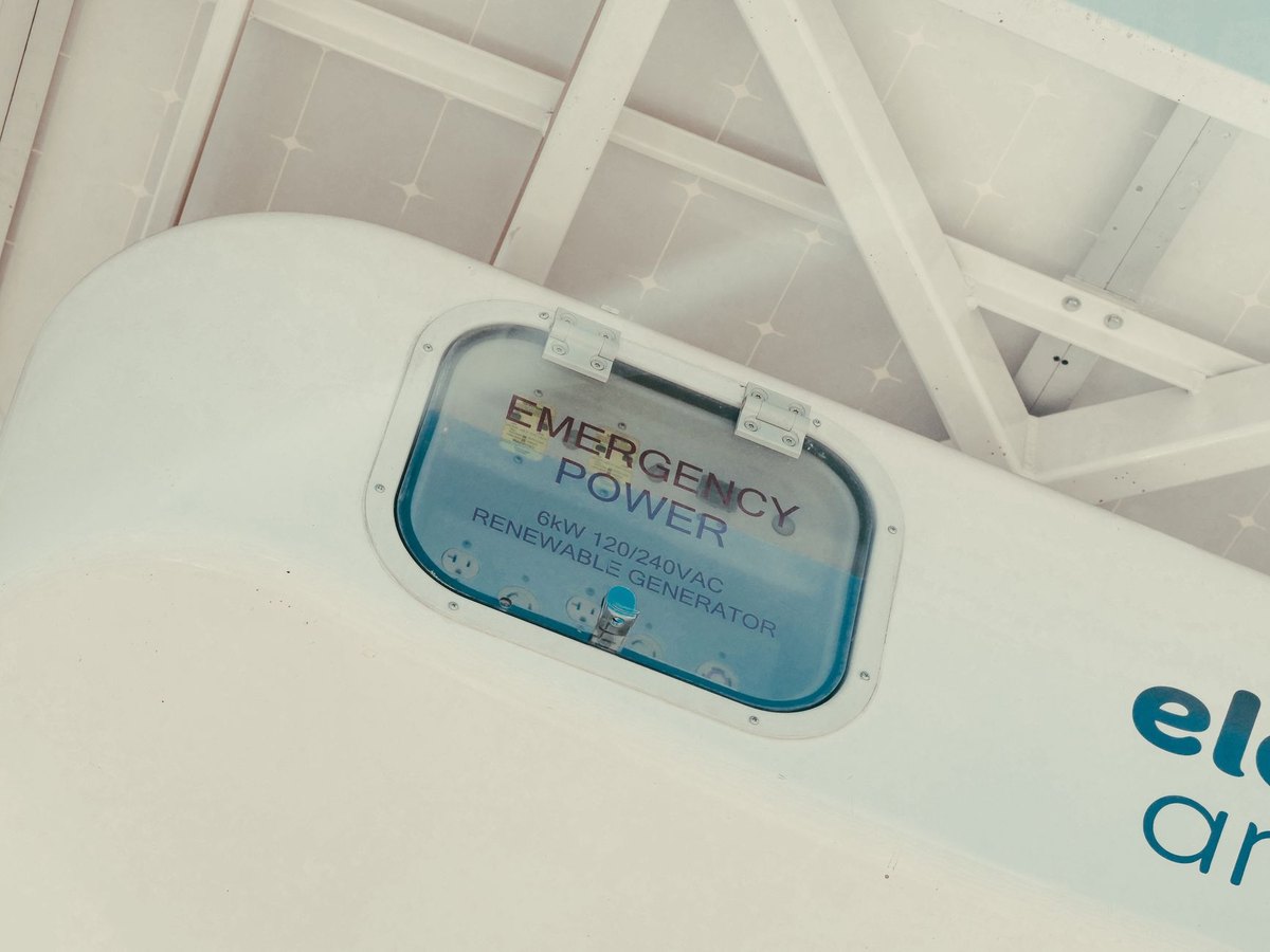 Emergency renewable power generator with solar panels overhead